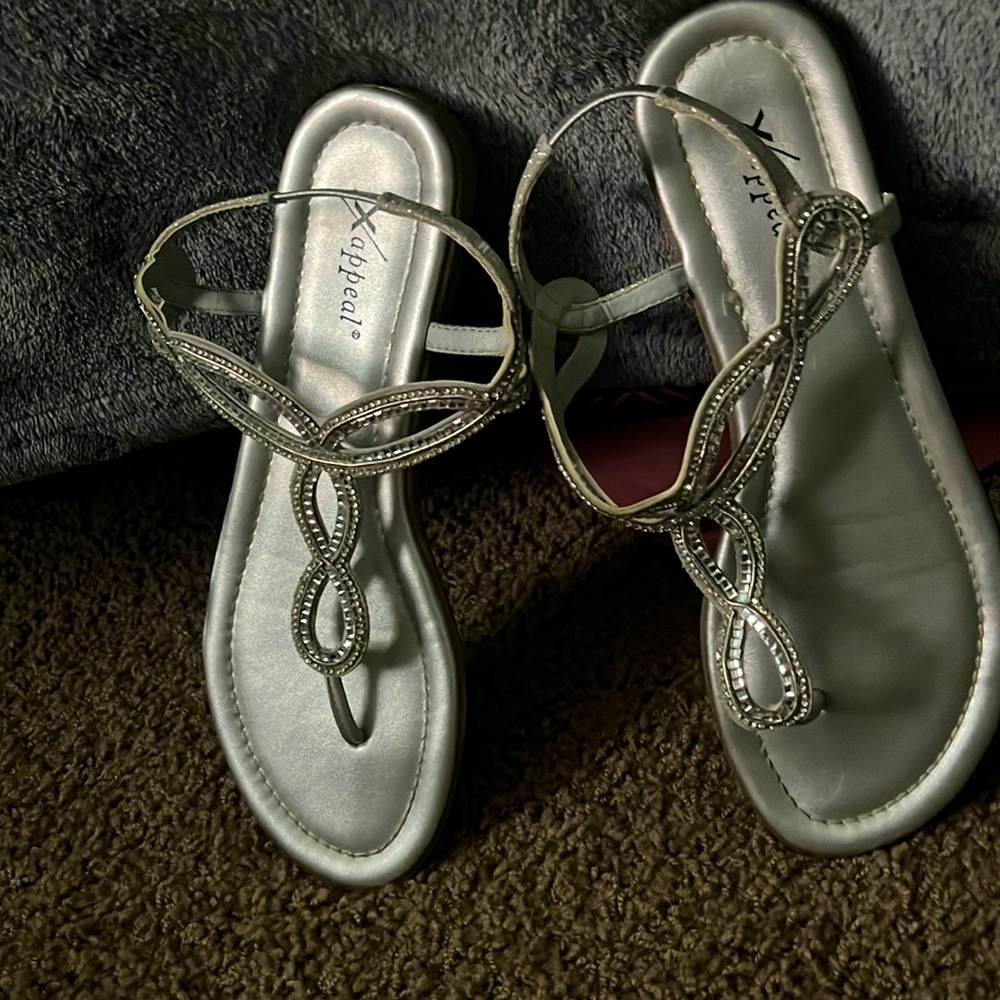 Silver, sparkling flat sandals. Fairly used
